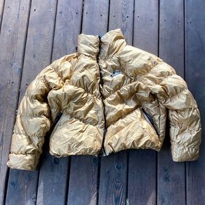 It’s a nice gold puffer jacket that I need to get rid of I don’t wear it at all.